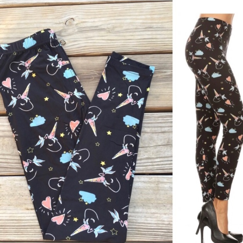 Black leggings with unicorn print fits size 10-18